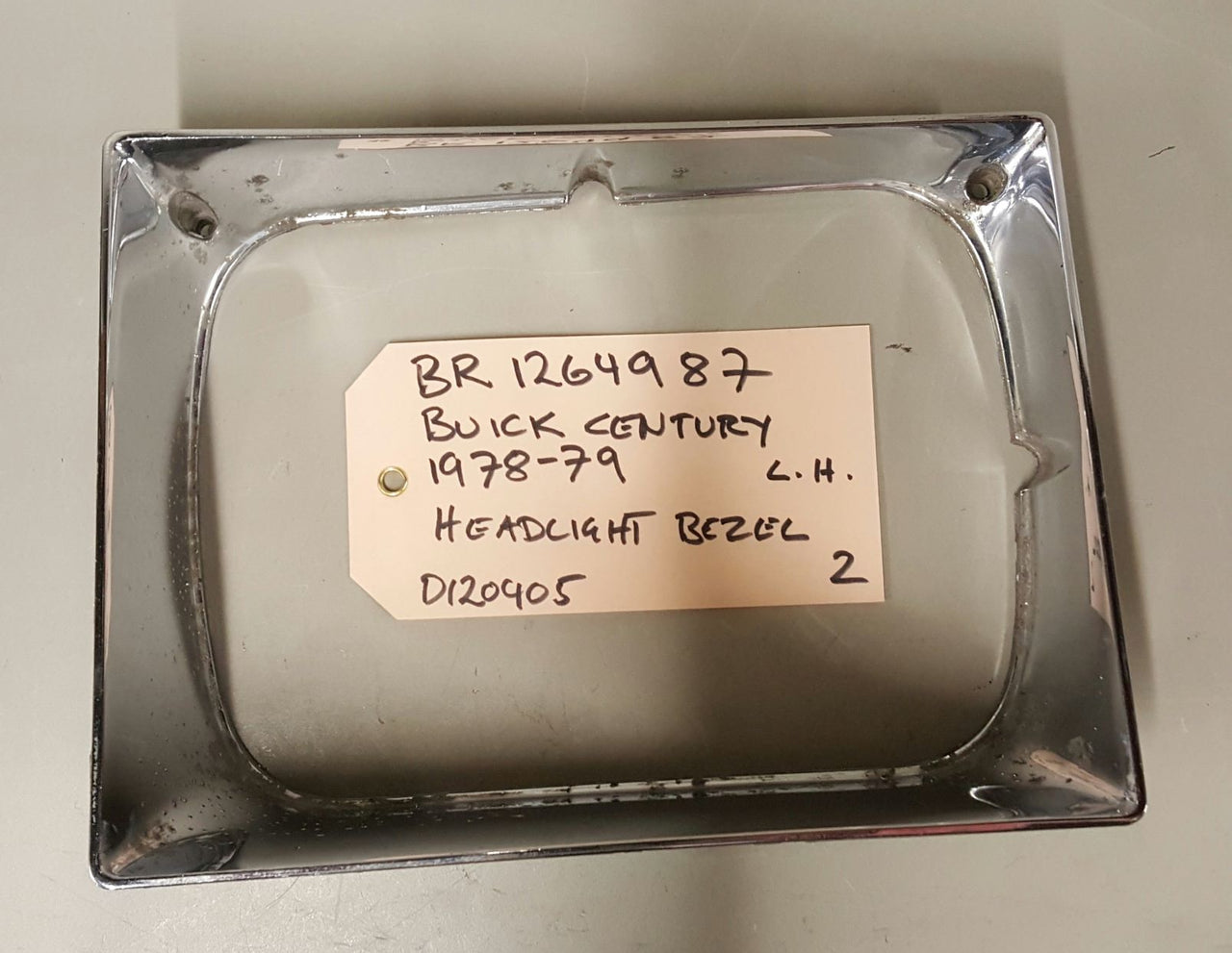 1978-79 Buick Century Headlight Bezel LH - BR1264987