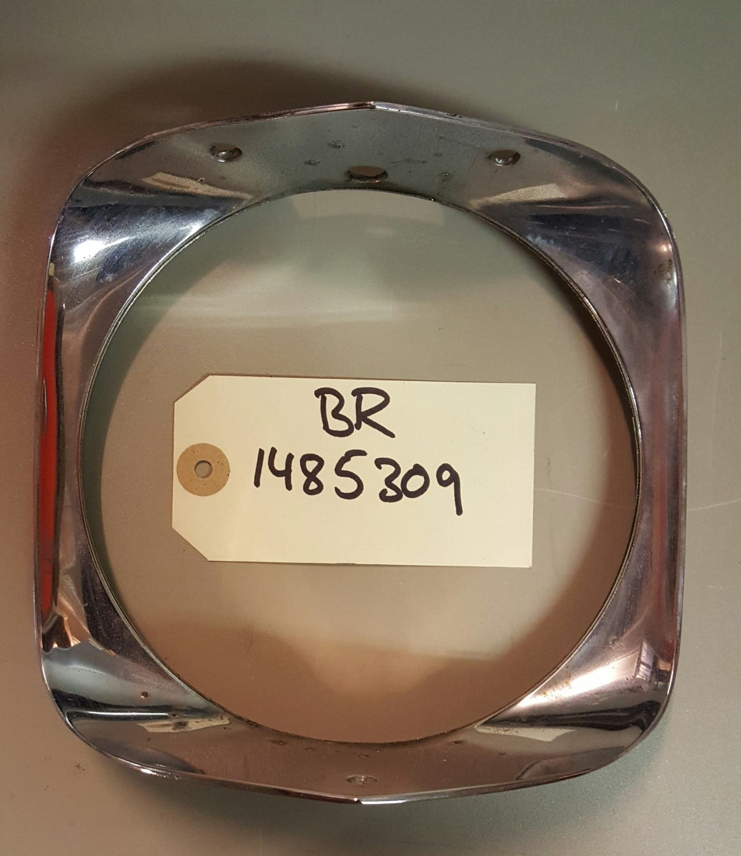 1966 Cadillac Headlamp bezel lower - BR1485309