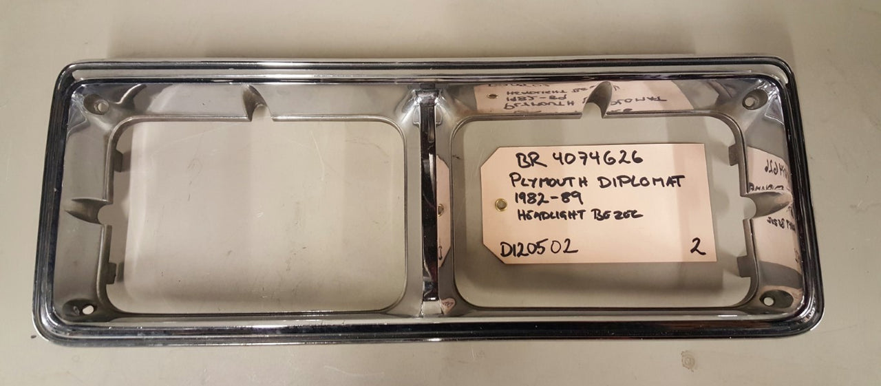 1982-89 Plymouth Diplomat Headlight Bezel - BR4074626