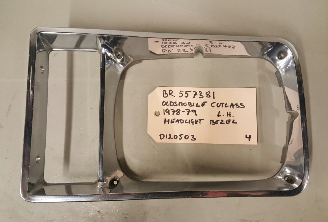 1978-79 Oldsmobile Cutlass Headlight Bezel LH - BR557381