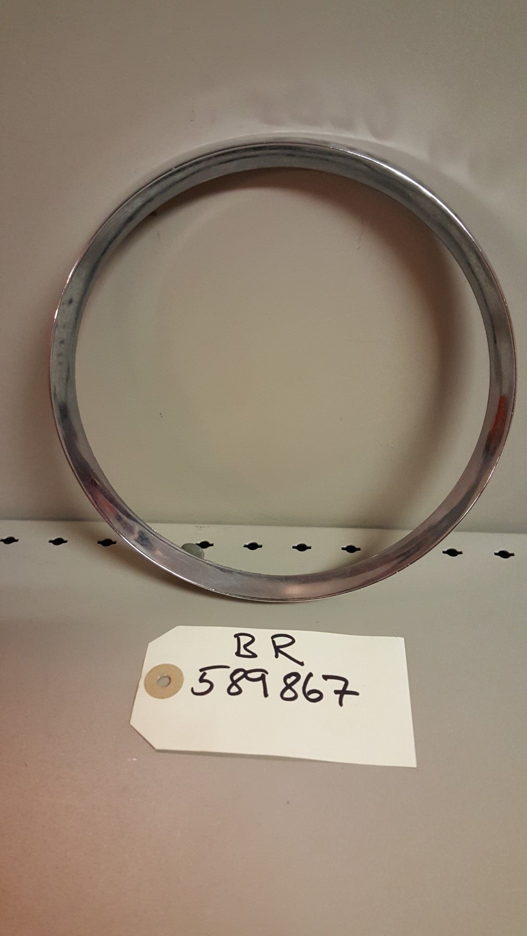 1965 Oldsmobile Bezel headlamp  LH - BR589867