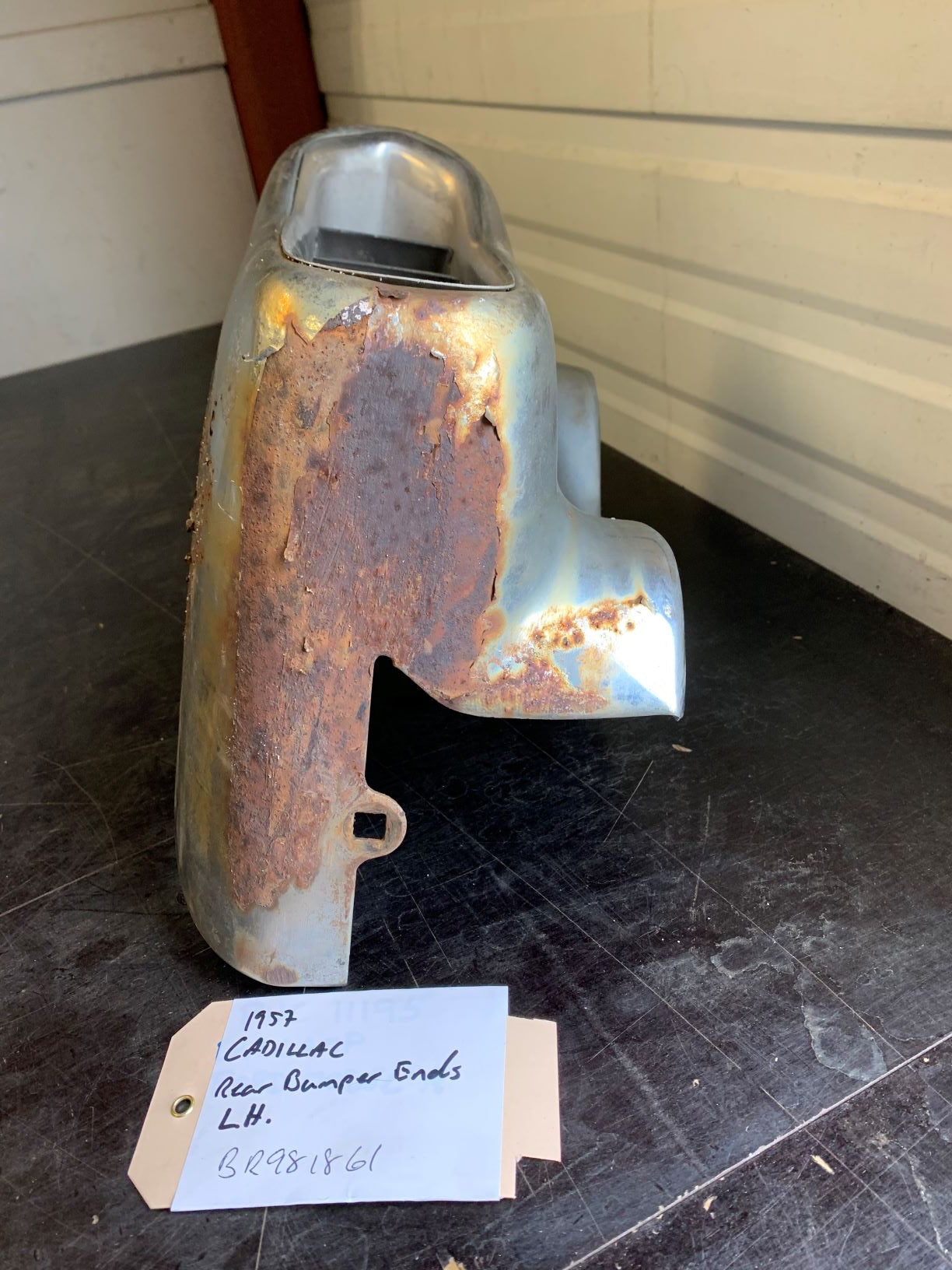 1957 Cadillac Rear Bumper Ends LH - BR981861