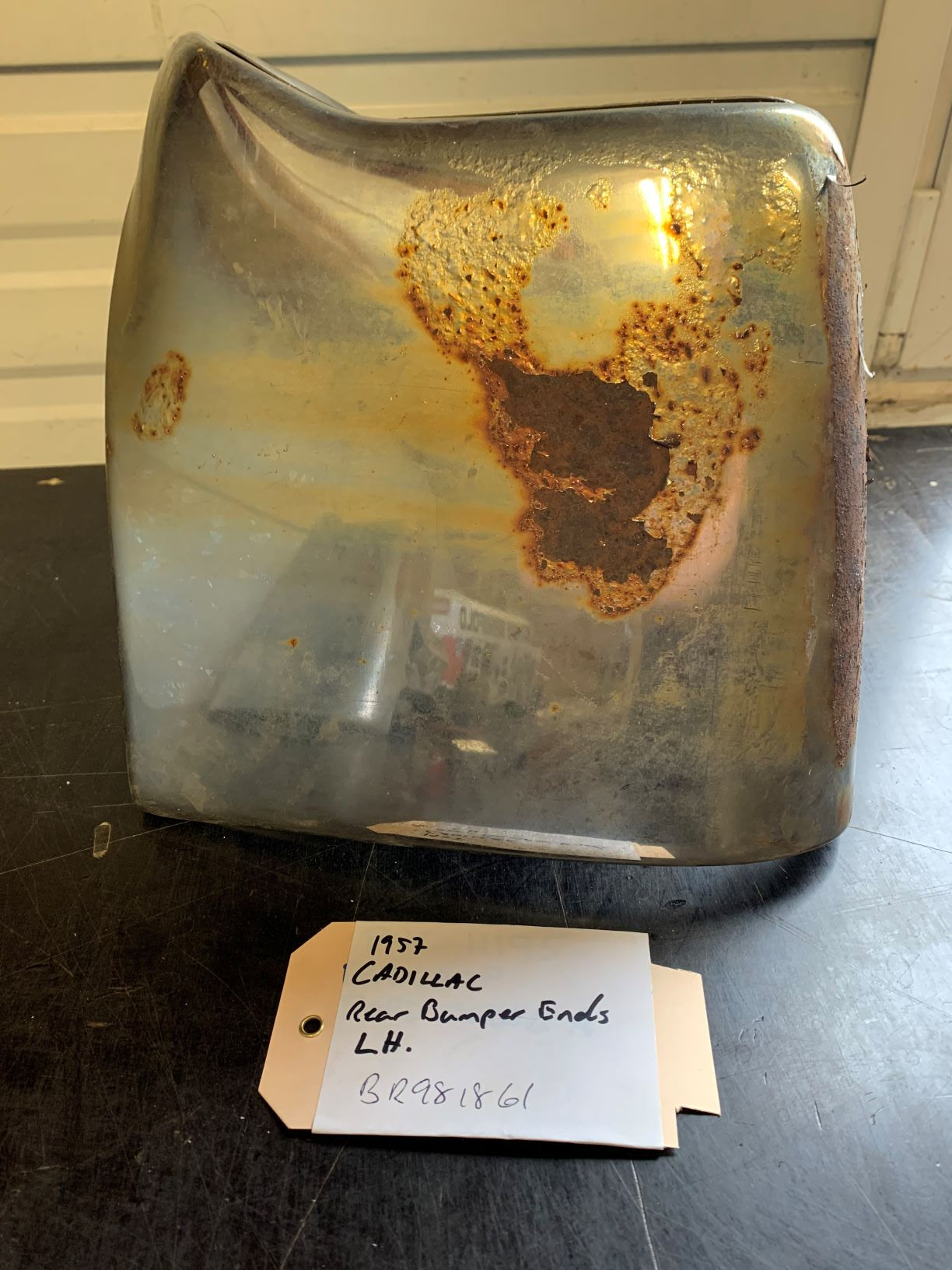 1957 Cadillac Rear Bumper Ends LH - BR981861