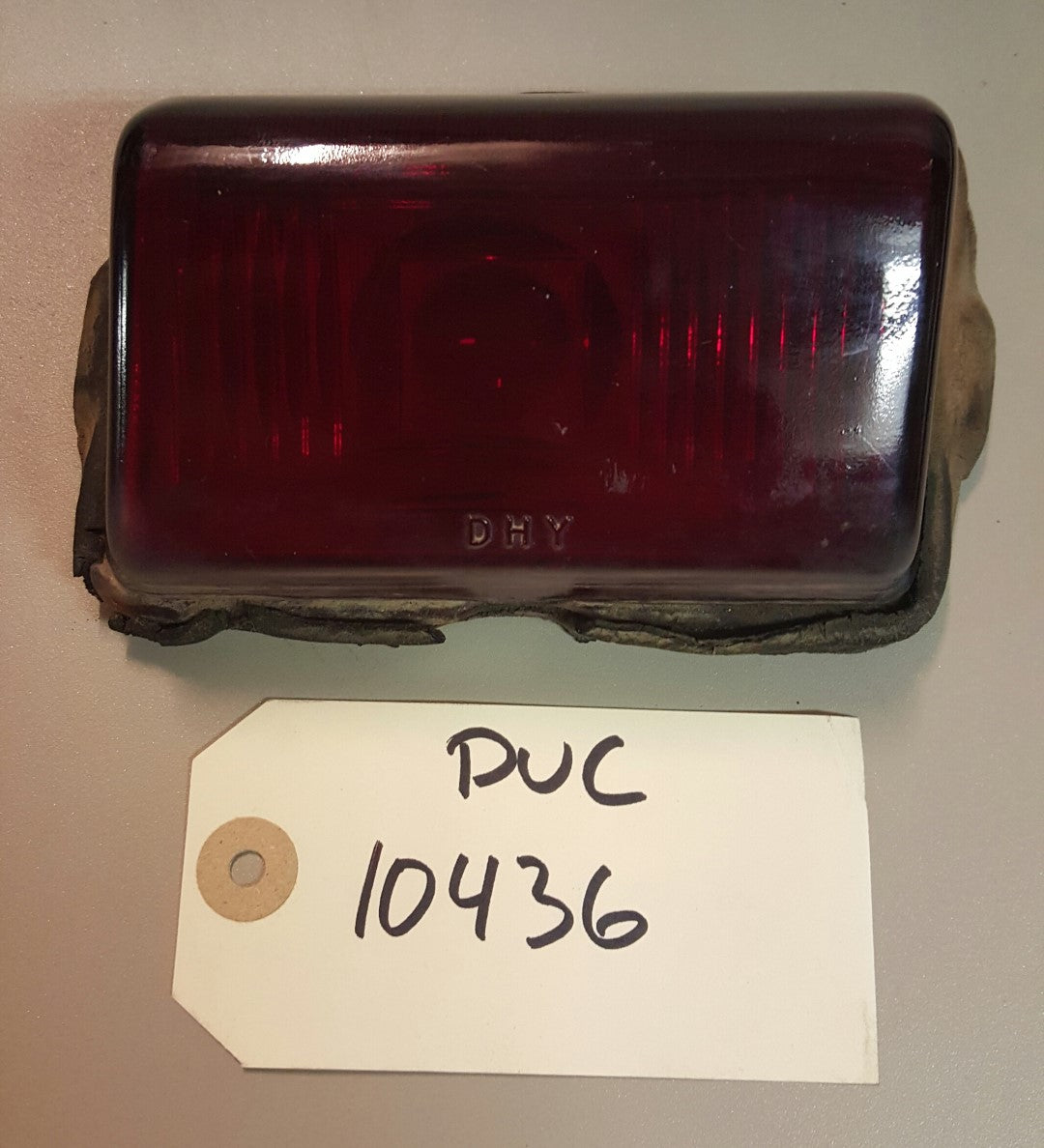 1946-48 Plymouth Tail lamp lens - PUC10436