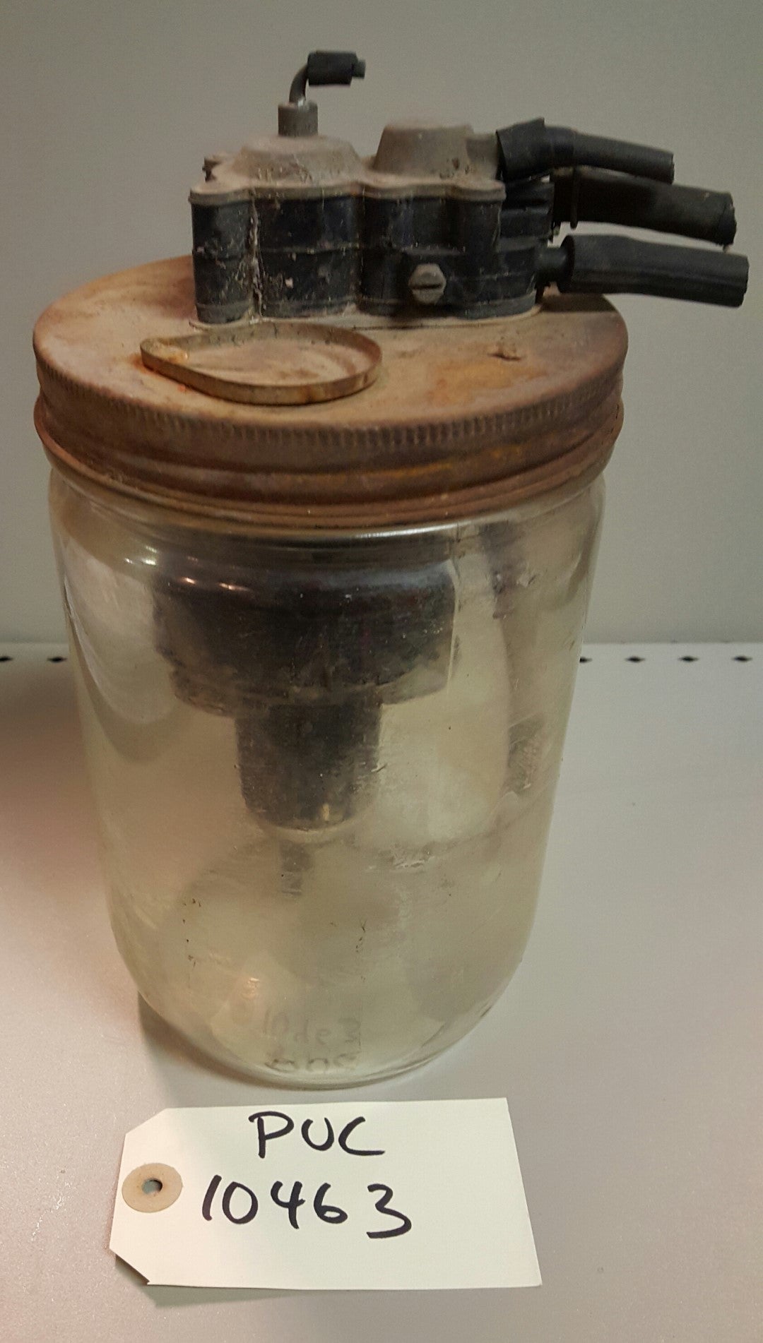 1957-58 Buick/Cadillac Windshield Washer Reservoir - PUC10463