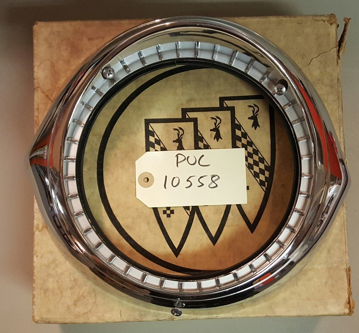 1956-57 Buick Headlamp Bezel - PUC10558