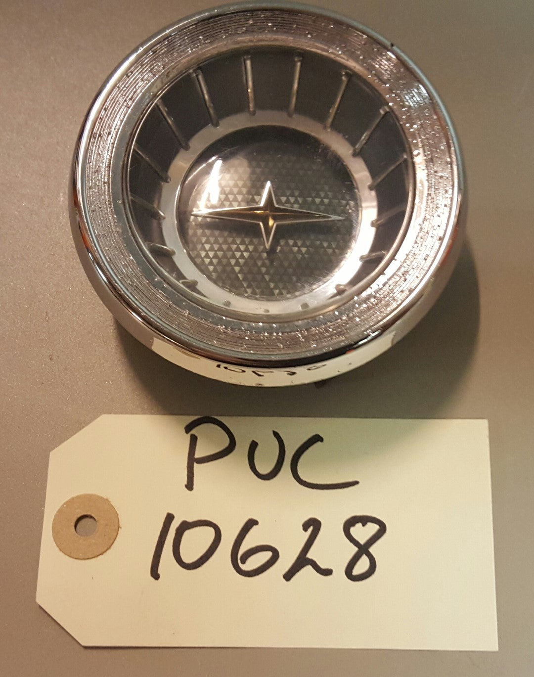 1963 Pontiac Hub Cap - PUC10628