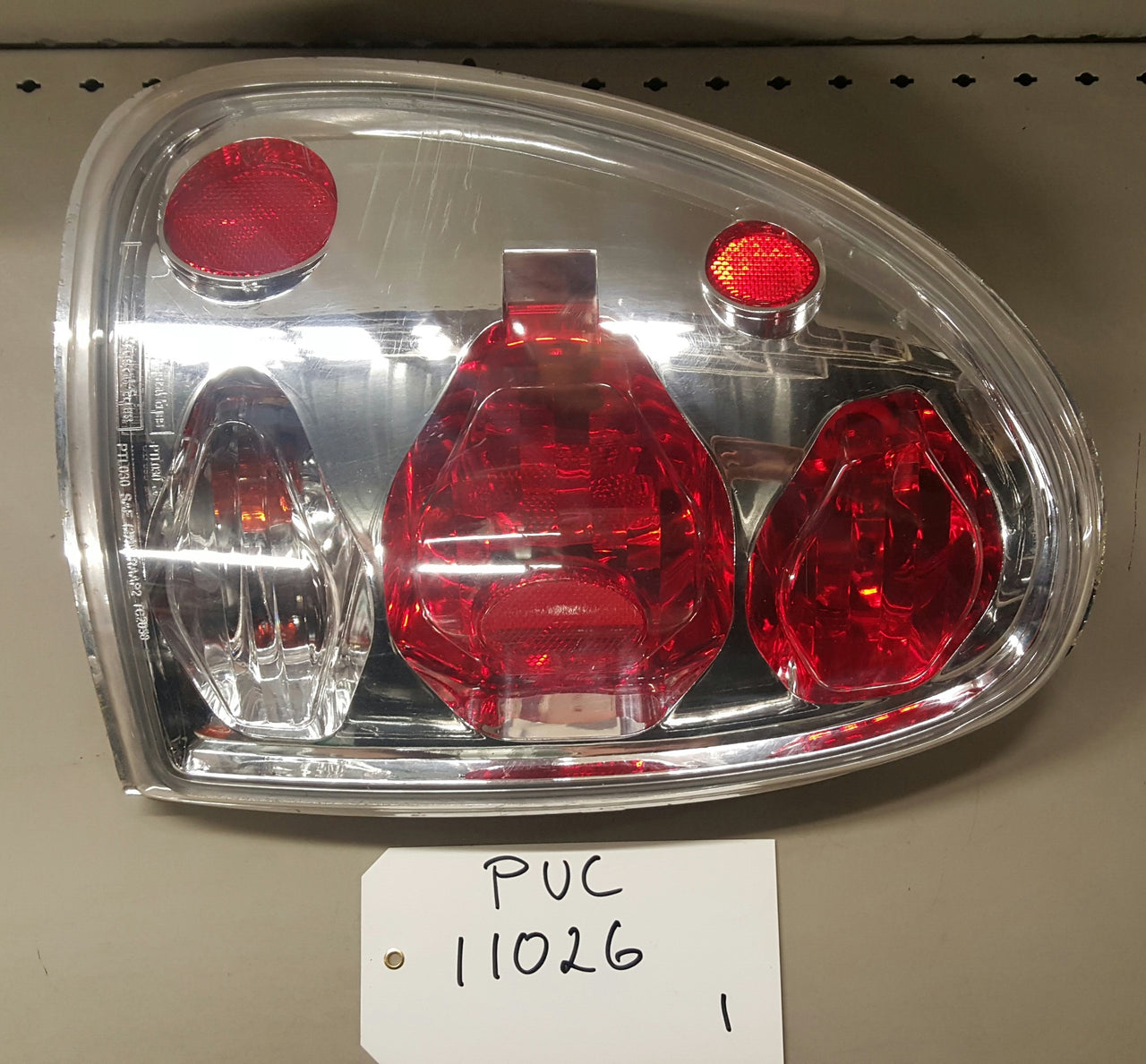 1996-00 Chrysler Voyager Tail lamp LH - PUC11026