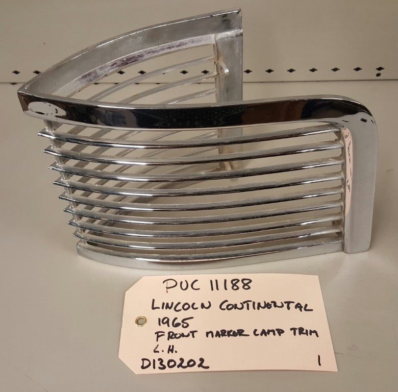 1965  Lincoln Cont. Front marker lamp trim LH - PUC111881